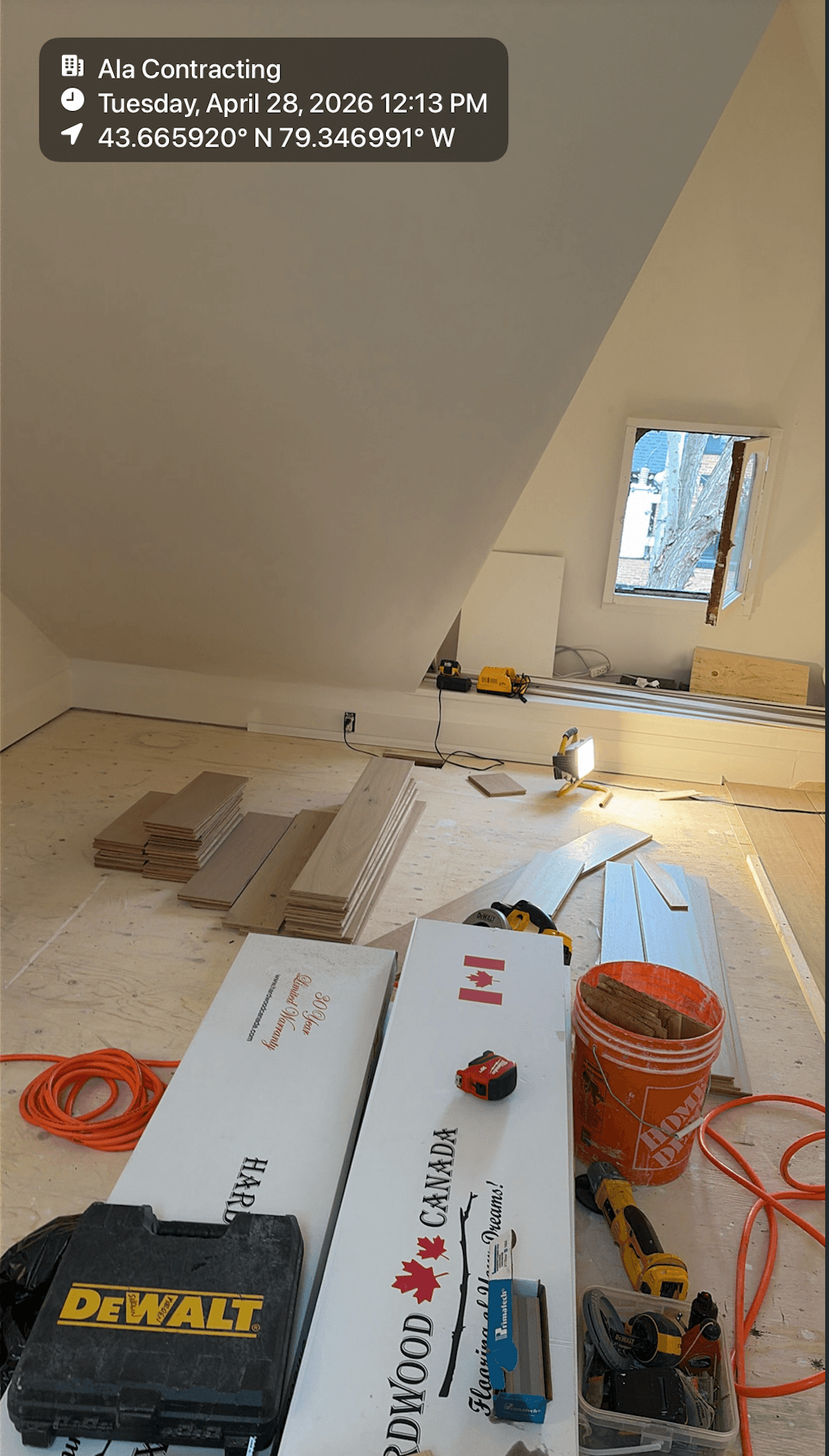 Jobsite progress photo mixed into a phone camera roll