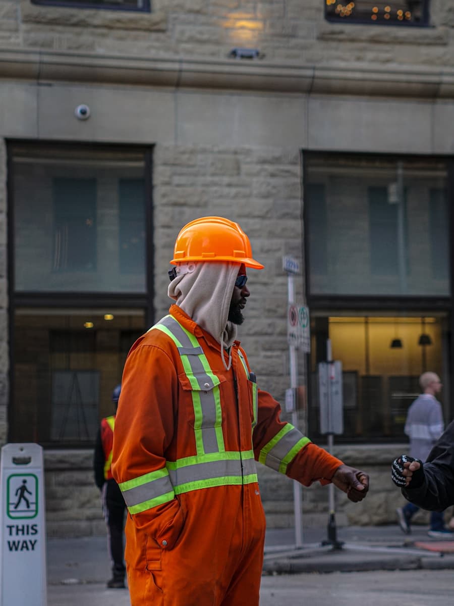 Construction worker photo mixed into a phone camera roll